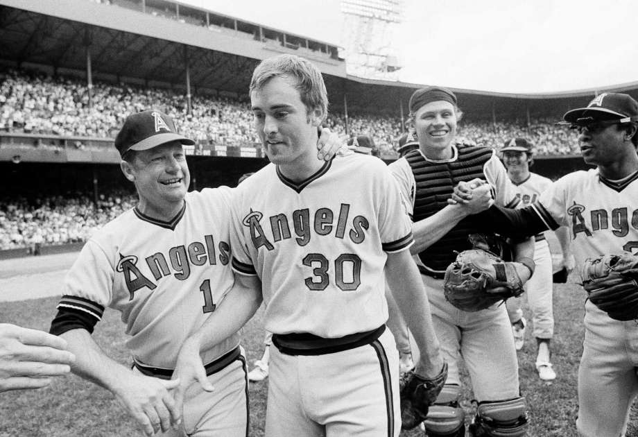 Pitcher Nolan Ryan of the California Angels lowers his head after