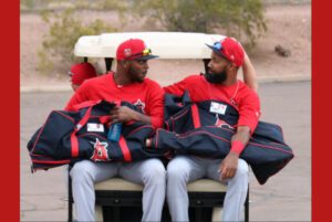 Justin Upton riding a golf cart at spring training