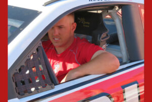 Mike Trout sitting in Ryan Blaney's race car