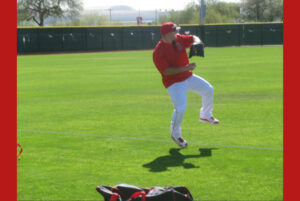 Mike Trout throwing a ball at spring training