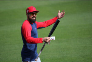 Anthony Rendon smiling with a bat at spring training 2023