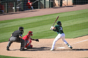 Athletics player batting left handed against Angels at Hohokam March 5, 2021