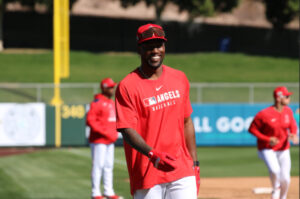 Jorge Soler from the waist up, smiling, at spring training 2025
