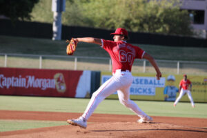 Trey Gregory-Alford pitching in the 2025 ACL. Red top and white pants.
