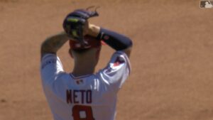 Neto hands on head
